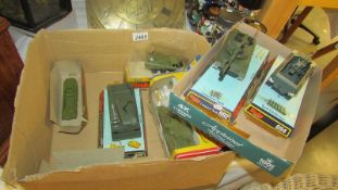 A collection of Dinky military vehicles.