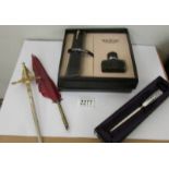 2 letter openers, a quill pen and a 'Hero' pen and ink gift set.