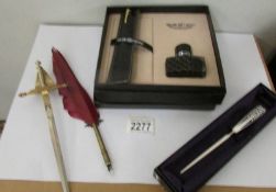 2 letter openers, a quill pen and a 'Hero' pen and ink gift set.