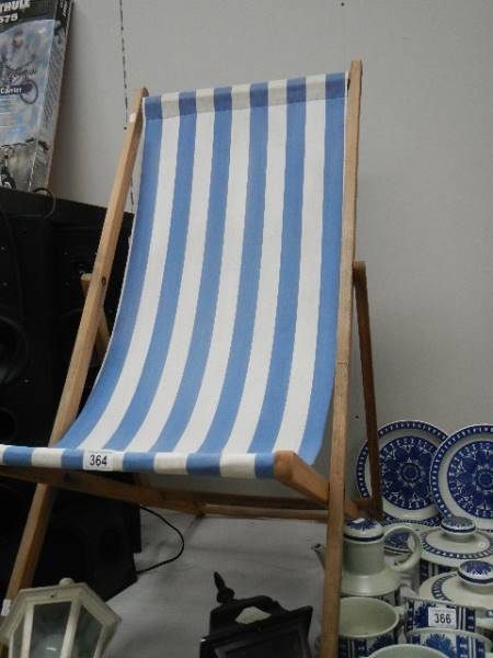 A vintage wooden deck chair.