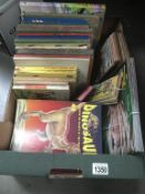 A quantity of vintage children's books including Noddy & a collection of dinosaurs magazines etc.