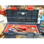 A tool box with assorted tools.