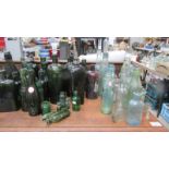 A quantity of glass bottles.