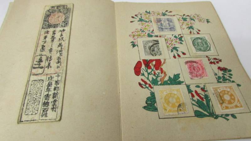 A Japanese album of Japanese stamps and postcards. - Image 3 of 7