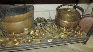 A mixed lot of brassware, metal ware, copper warming pan etc.