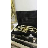 A cased Blessing USA cornet with mouthpiece (needs some attention to valves to enable playing).