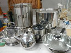 A quantity of stainless steel pans, bread bins etc.