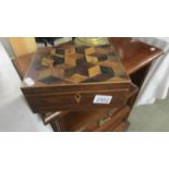 A parquetry inlaid box.