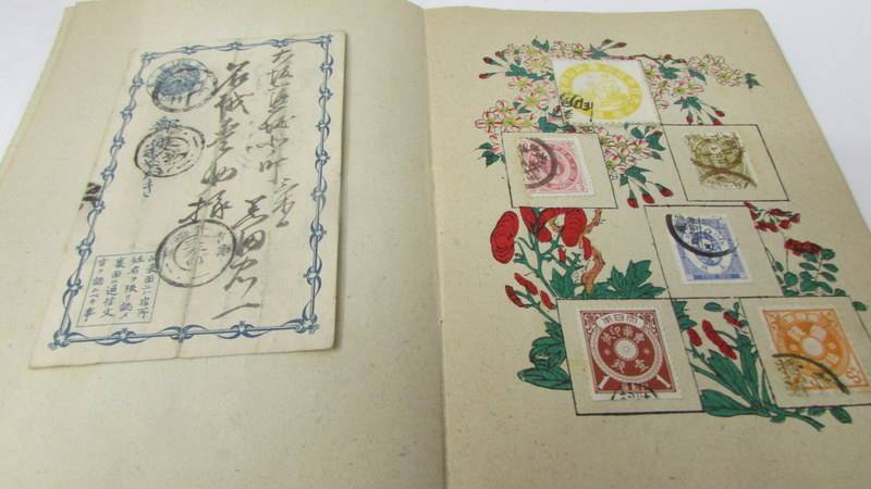 A Japanese album of Japanese stamps and postcards. - Image 7 of 7