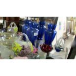 A mixed lot of coloured glass including two blue glass vases.