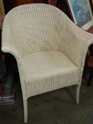 A Lloyd Loom style chair.