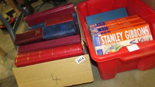 A box of stamp ephemera, catalogues etc.