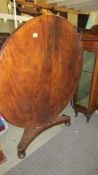 A Victorian oval mahogany tip top loo table.