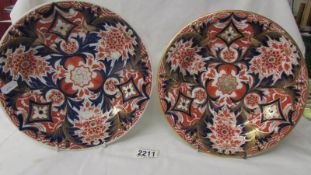 A good pair of oriental imari design plates.