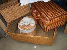 A picnic basket with part contents, linen bin etc.