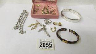 A Vintage silver bangle, a silver curb bracelet and a quantity of earrings etc., in yellow metal.
