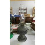 A Victorian oil lamp.