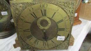 A brass long case clock face fitted with battery movement.