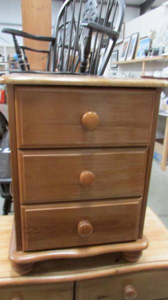 A solid pine 3 drawer bedside chest, 46 x 39 x 61 cm tall.