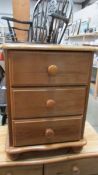 A solid pine 3 drawer bedside chest, 46 x 39 x 61 cm tall.