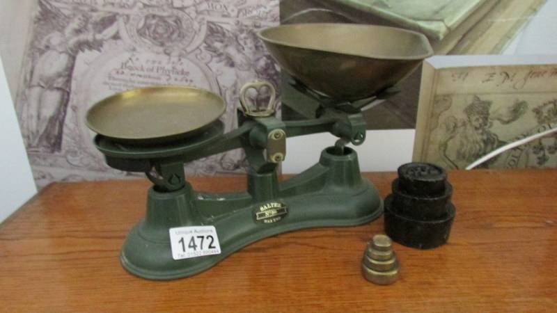 A set of Salter No.56 kitchen scales with weights.