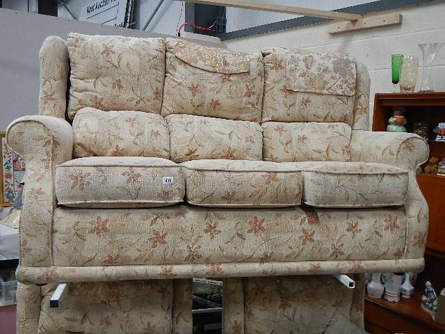 A three piece suite in good condition.