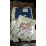A box of United Nations stamps, commemorative covers, ephemera etc.