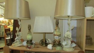 2 onyx table lamps, 2 metal floral table lamps and one other.