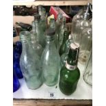 A large lot of clear 'local area' bottles