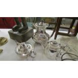 2 good clean silver plate teapots and a silver plate hot water jug.