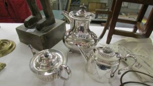 2 good clean silver plate teapots and a silver plate hot water jug.