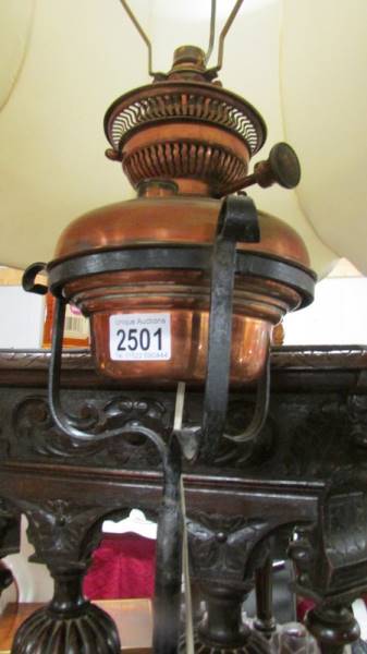 A wrought iron standard lamp with copper font, converted to electric. - Image 3 of 3