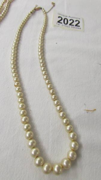 A Ciro pearl necklace with 9ct gold clasp together with a double strand pearl necklace. - Image 2 of 3