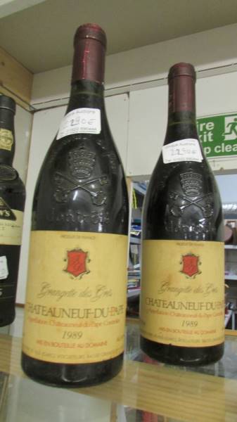 Two bottles of Chateauneuf du Pape champagne.