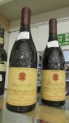 Two bottles of Chateauneuf du Pape champagne.