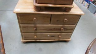 A solid pine chest of drawers, 85 x 37 x 61 cm high.