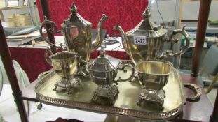 A five piece silver plate tea service on gallery tray, maker G S C.