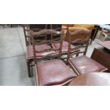 A set of 4 Edwardian oak dining chairs with inset seats, (seats need attention).