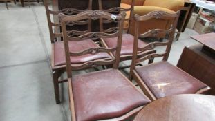 A set of 4 Edwardian oak dining chairs with inset seats, (seats need attention).