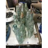 A good lot of clear glass bottles