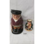 A Royal Doulton traditional Toby Jug The Huntsman and a smaller example Honest Measure.