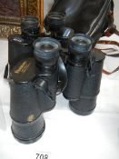 Two pairs of binoculars.