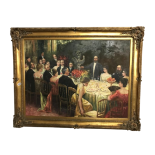 A superb gilt framed oil on canvas depicting a Russian dinner party,