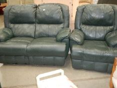 A green leather 2 seat sofa and chair.