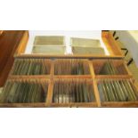 1. Glass stereo negatives - A collection of c. 57 early glass collodion stereo negatives c.