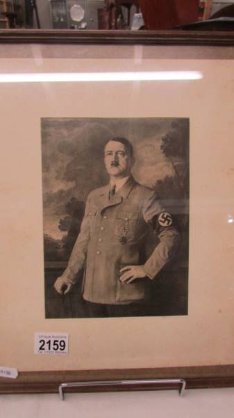 A framed and glazed period Nazi era picture of Adolf Hitler.