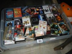 A large crate of assorted cassette tapes, various genre's of music.