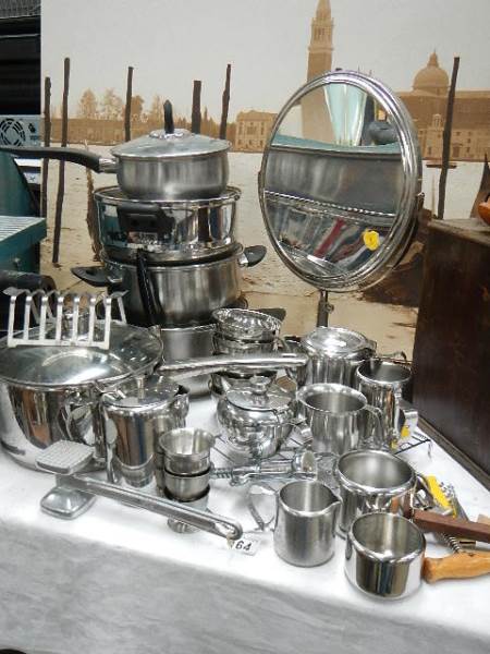 A mixed lot including stainless steel pans, jugs etc.