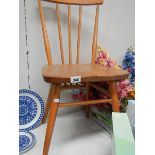 An Ercol dining chair.