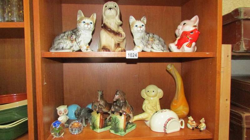 A mixed lot including Mdina glass vase, paperweights, cat and other ornaments.